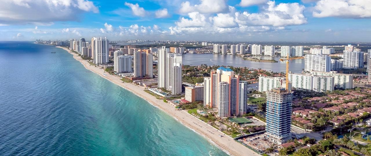 Sunny Isles Beach condominium skyline aerial along the Atlantic